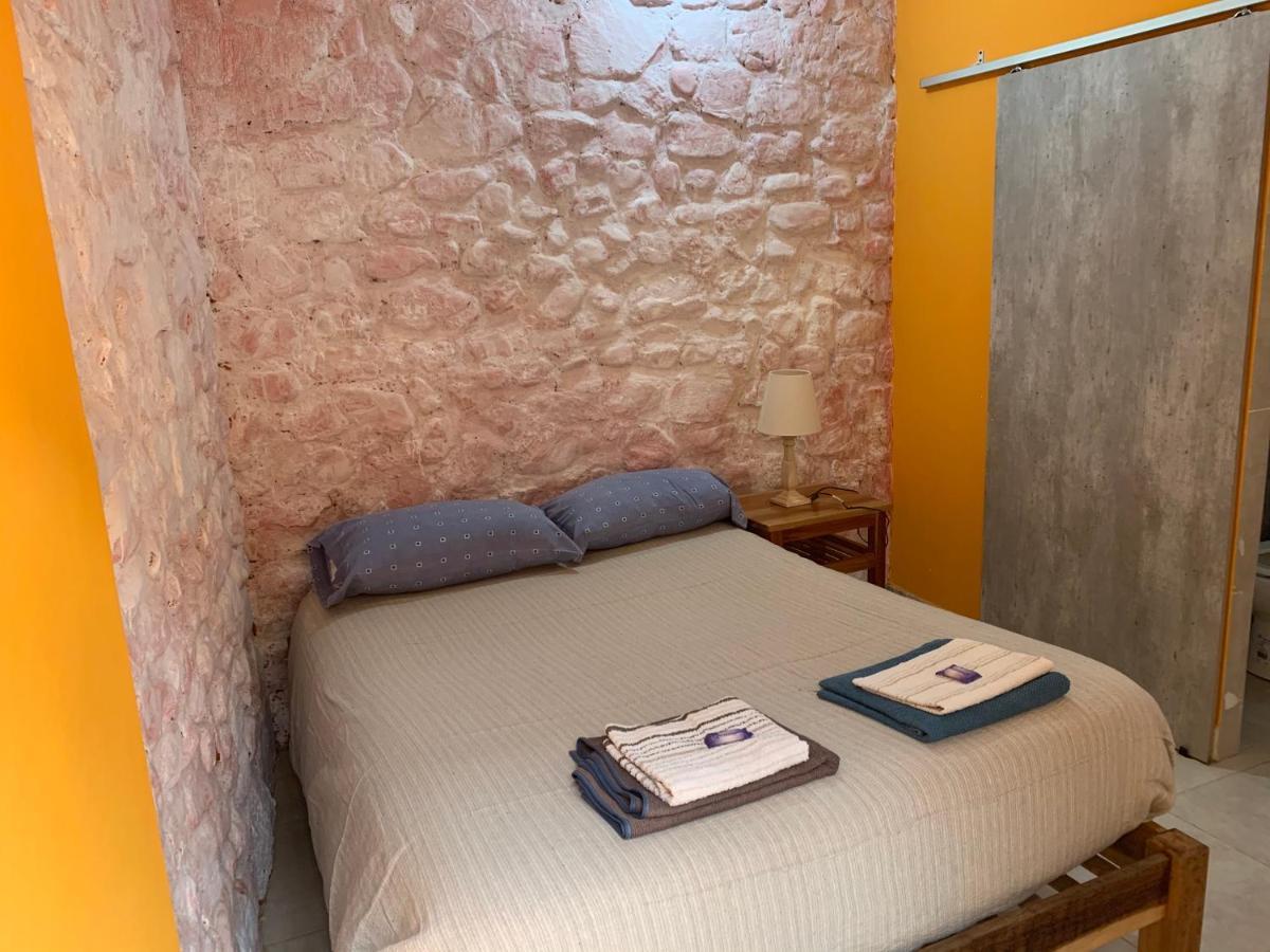Hostal Casa De Piedra อูมาวากา ภายนอก รูปภาพ